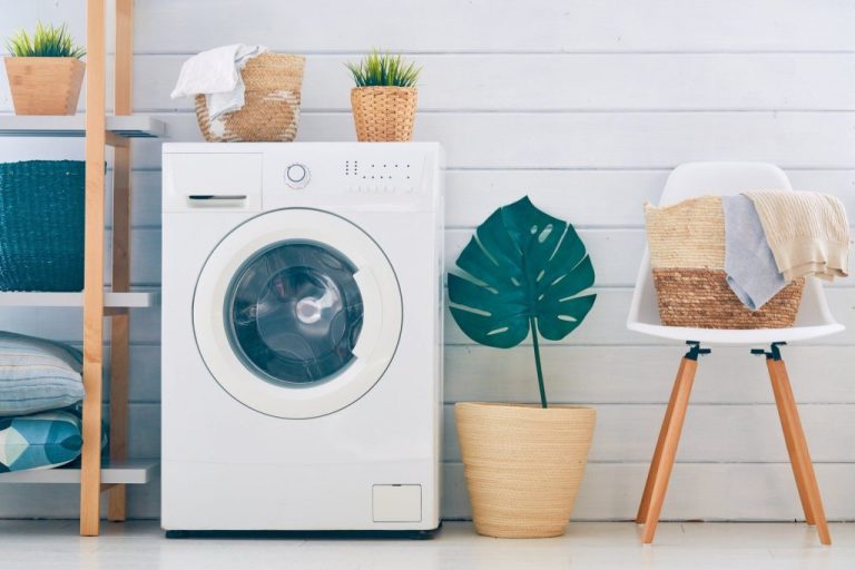 laundry room with awashing machine in Okotoks